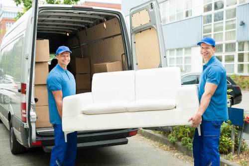 Removal van and moving crew serving homes in West Hampstead