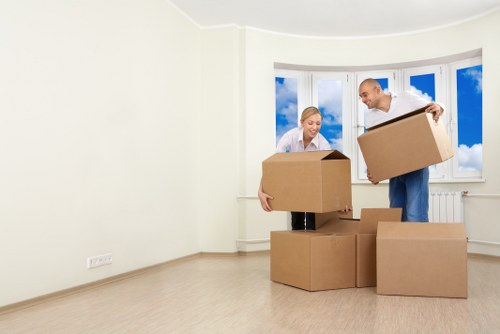 Local furniture collection team handling bulky items in West Hampstead