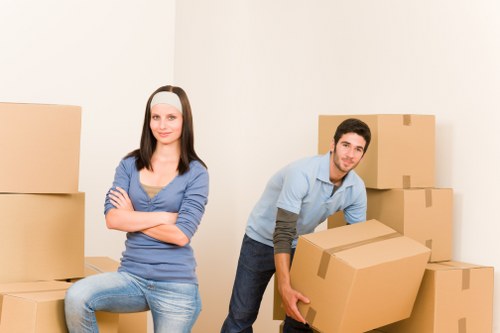 Packed household boxes ready for a local move in West Hampstead