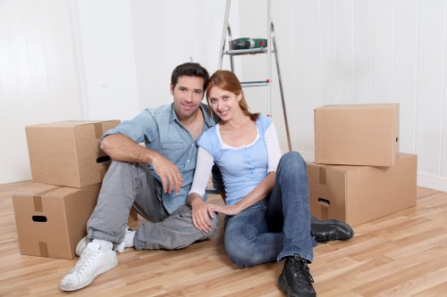 Removal team loading furniture for a West Hampstead move