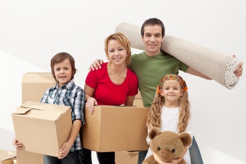 Moving boxes and household items in a typical West Hampstead flat