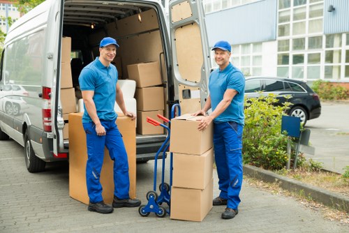 Packed office boxes and workstations ready for transport