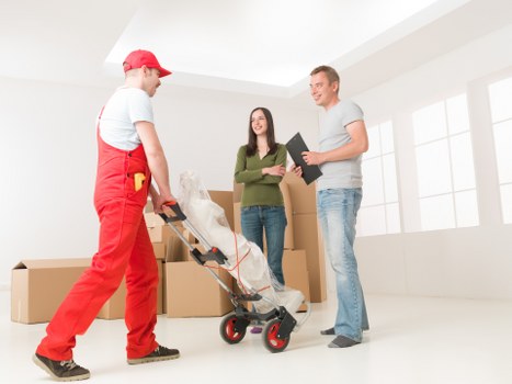 Careful handling of boxes and furniture during a local van move