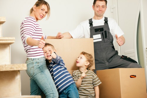 Careful loading of household furniture into a removals truck in West Hampstead